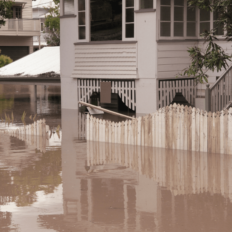 La Nina weather event - house sitting in flood waters